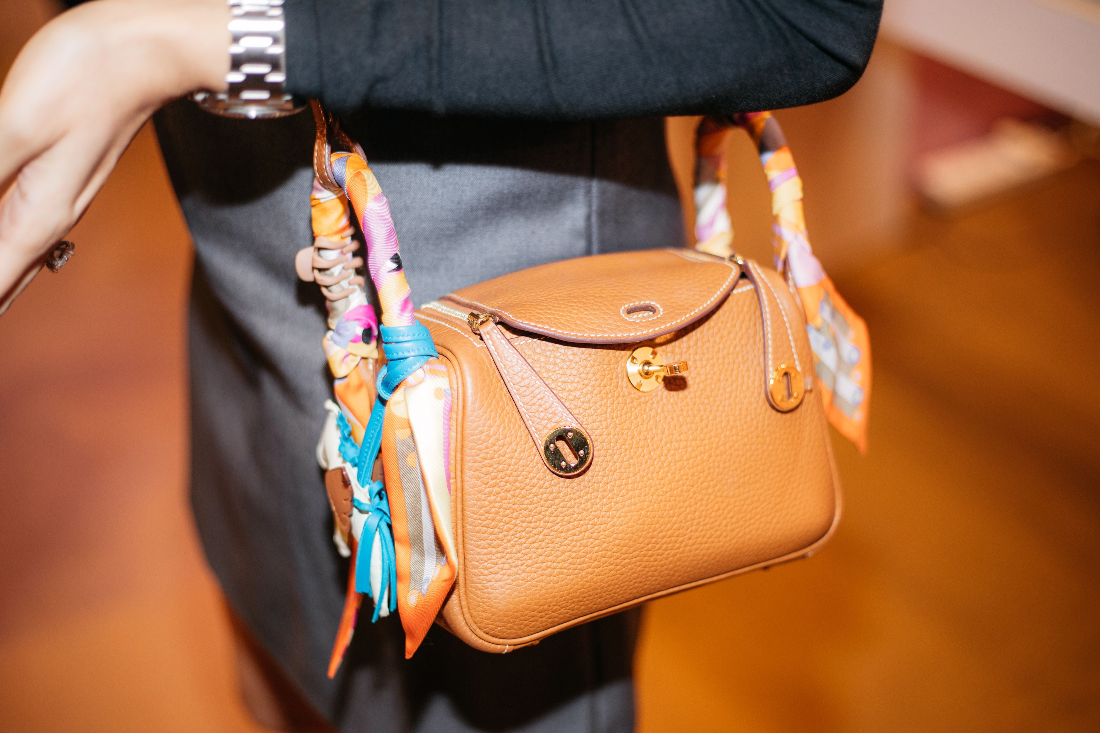 Founder of Studio Nails, Anisha Mulchandani, with her Hermès Lindy bag at The Wedding Collective