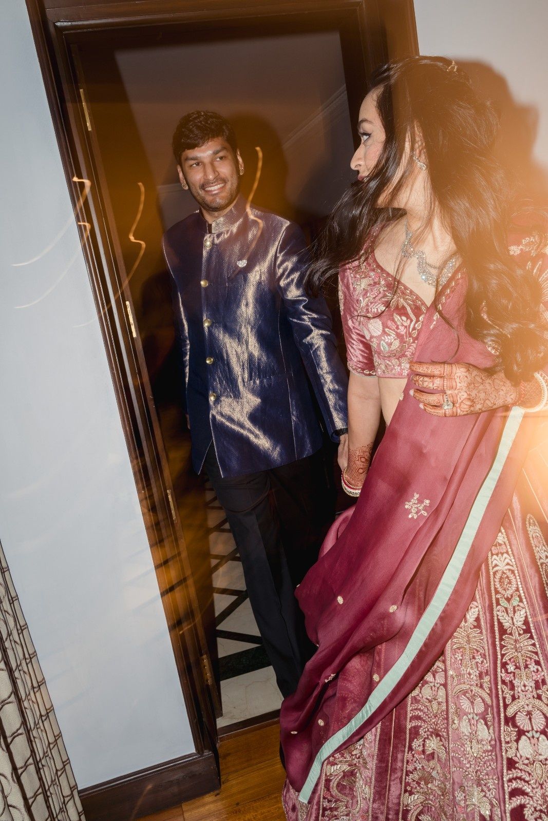 For the reception, Dhwani changed into a Kshitij Jalori lehenga. Aman in an Akaaro jacket