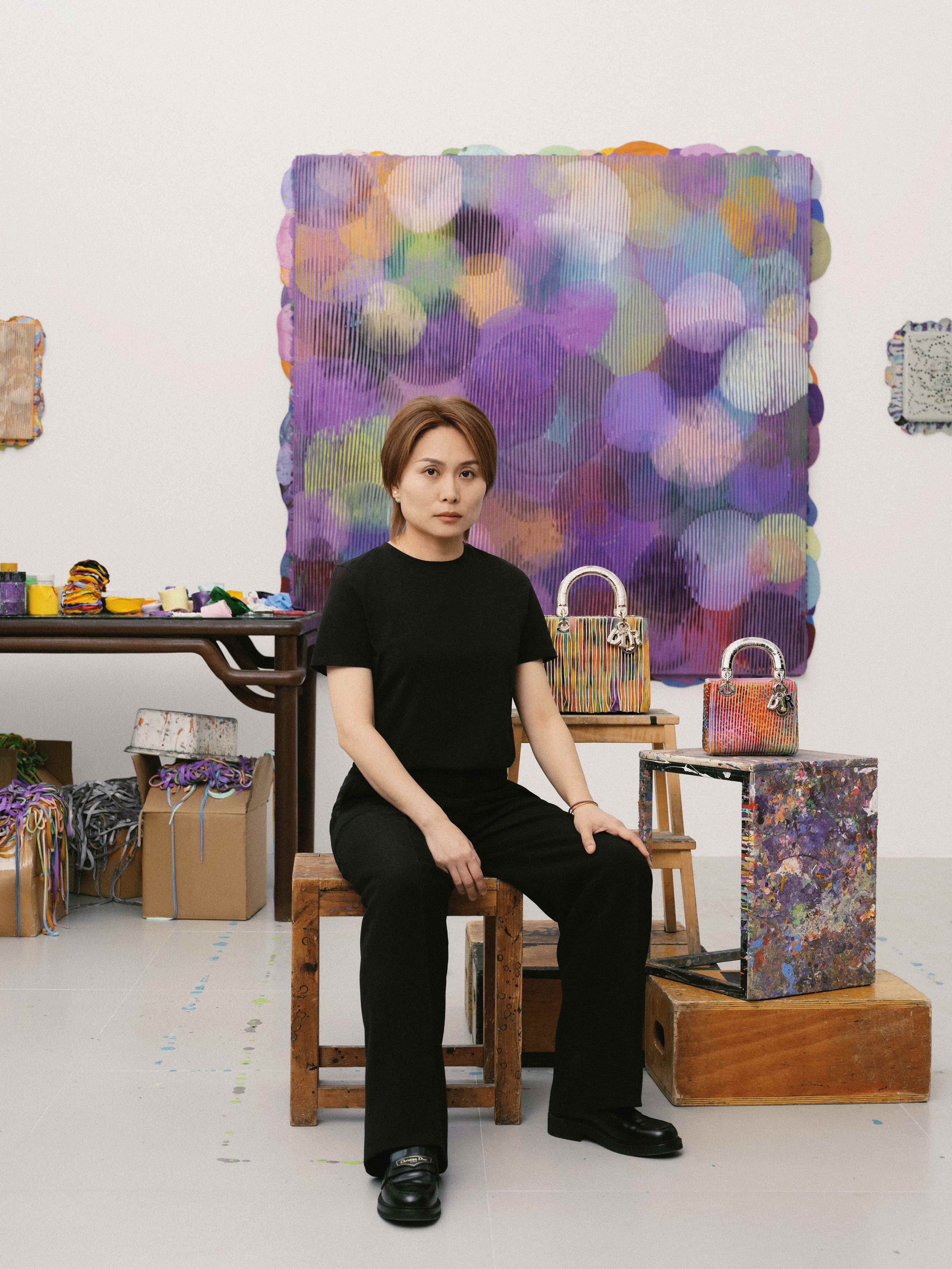 Contemporary Chinese artist Ju Ting with the limited-edition Lady Diors created for the 10th edition of the Lady Art Project