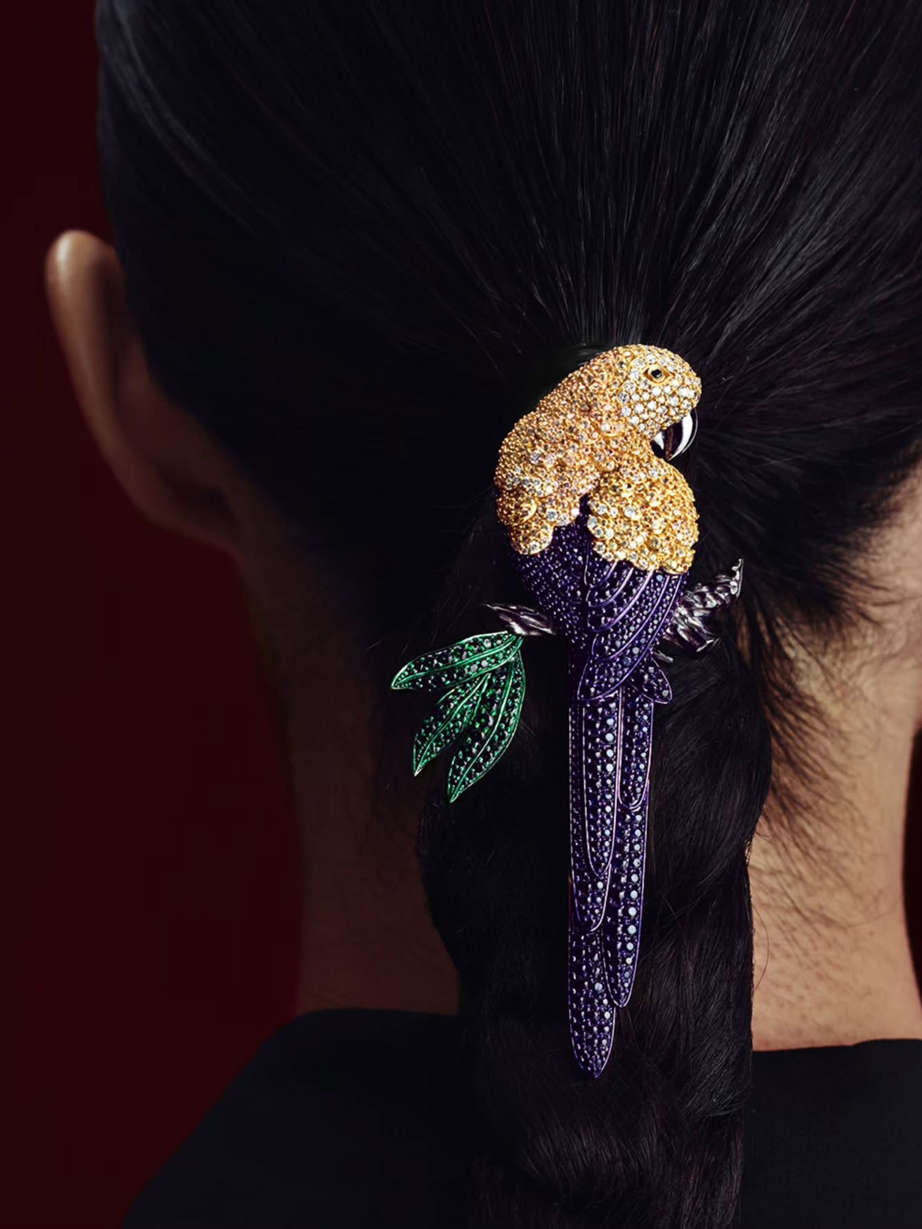 A bejeweled parrot hair pin by Kantilal Chhotalal