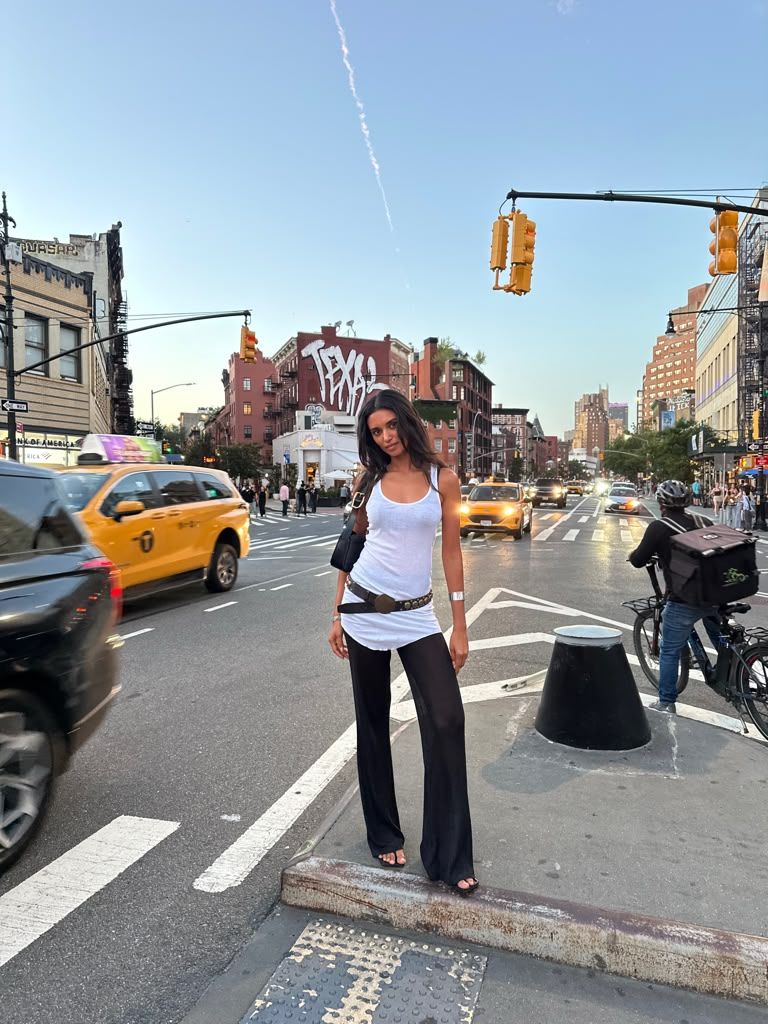 Model Madhulika Sharma in a white tank top