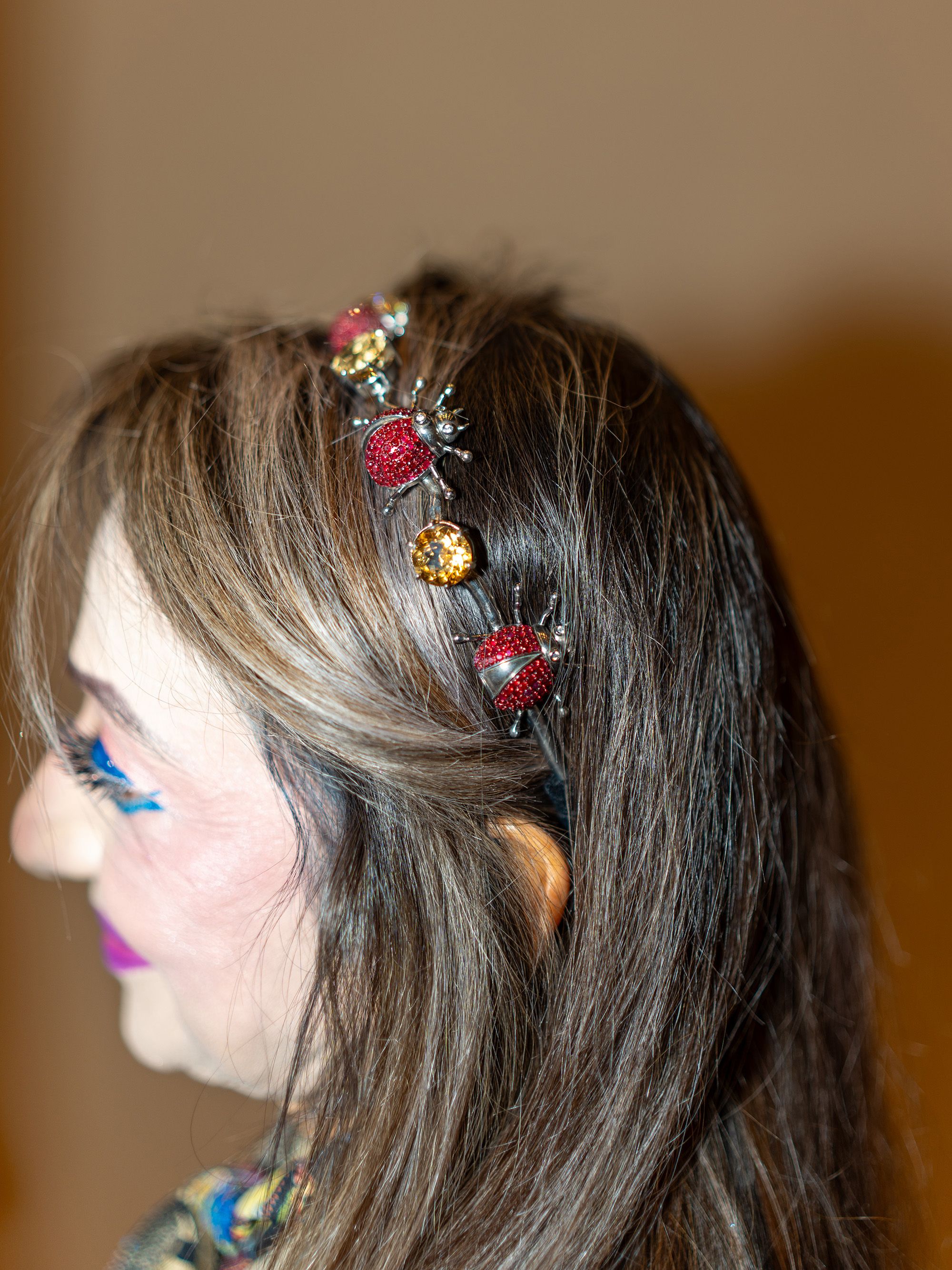 Malti Jain wears a bejwelled beetle headband by Queenie Dhody