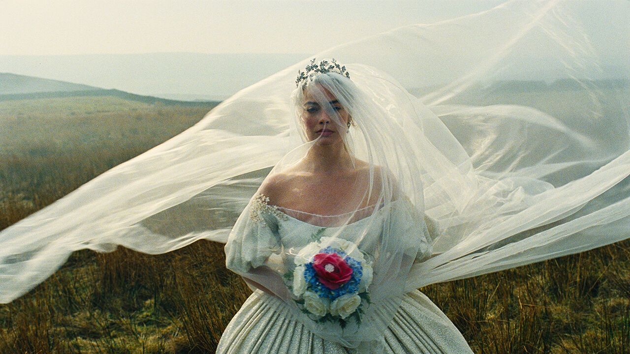 Margot Robbie as Catherine Earnshaw in "Wuthering Heights". Her wedding dress is an amalgam of Victorian and 1950s design elements