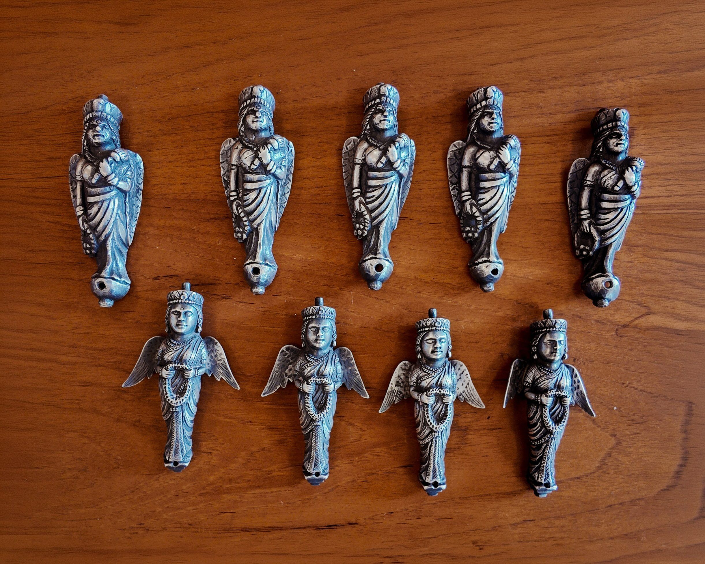 A series of pure silver angel figurines from Monica Shah’s private collection