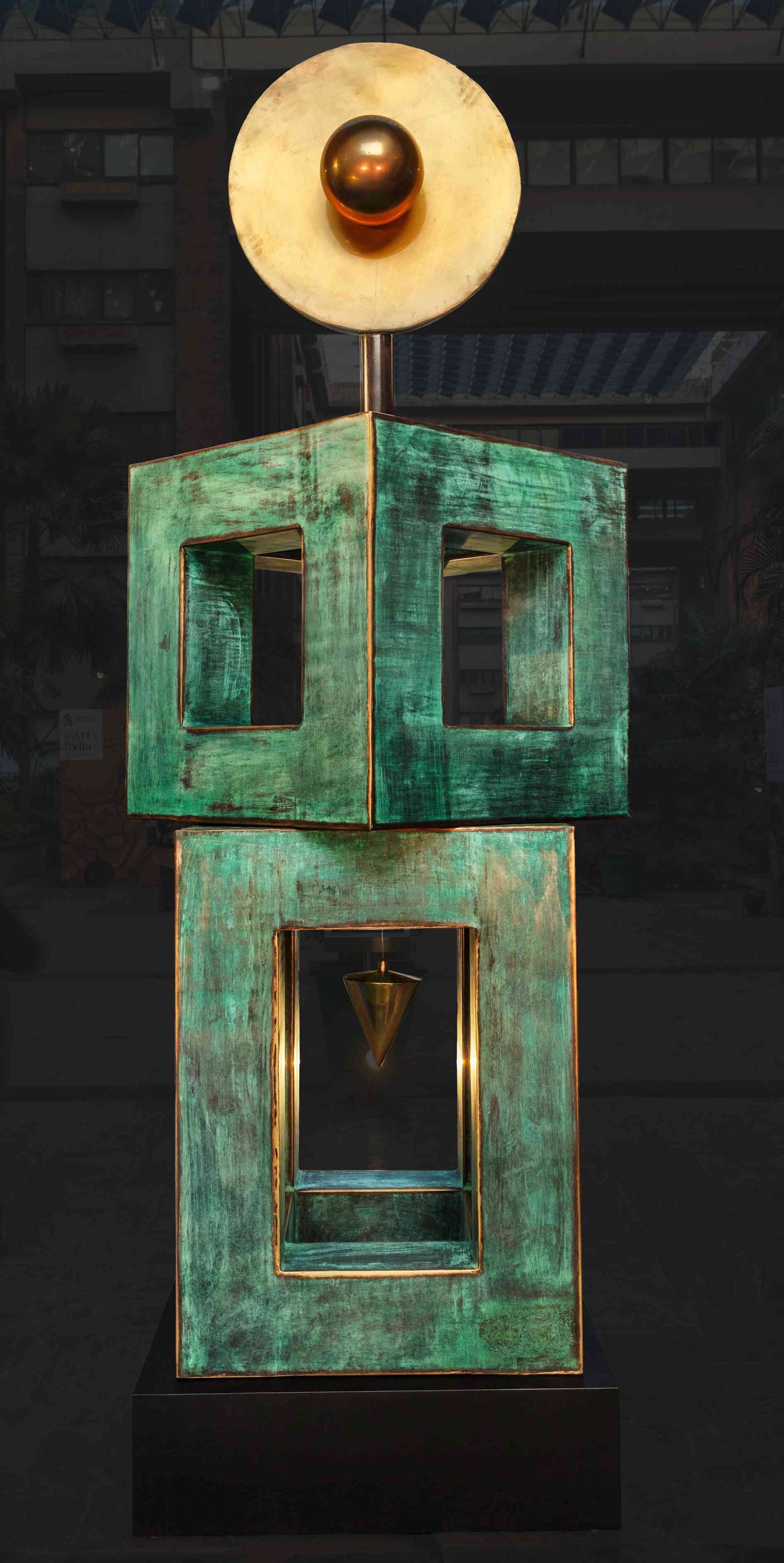 Paresh Maity_ Equilibrium_Front View_Brass_305 x 91 x 91 cm_500 kg_2025 - 26_Image Courtesy Art Alive Gallery & Paresh Maity (1).jpg