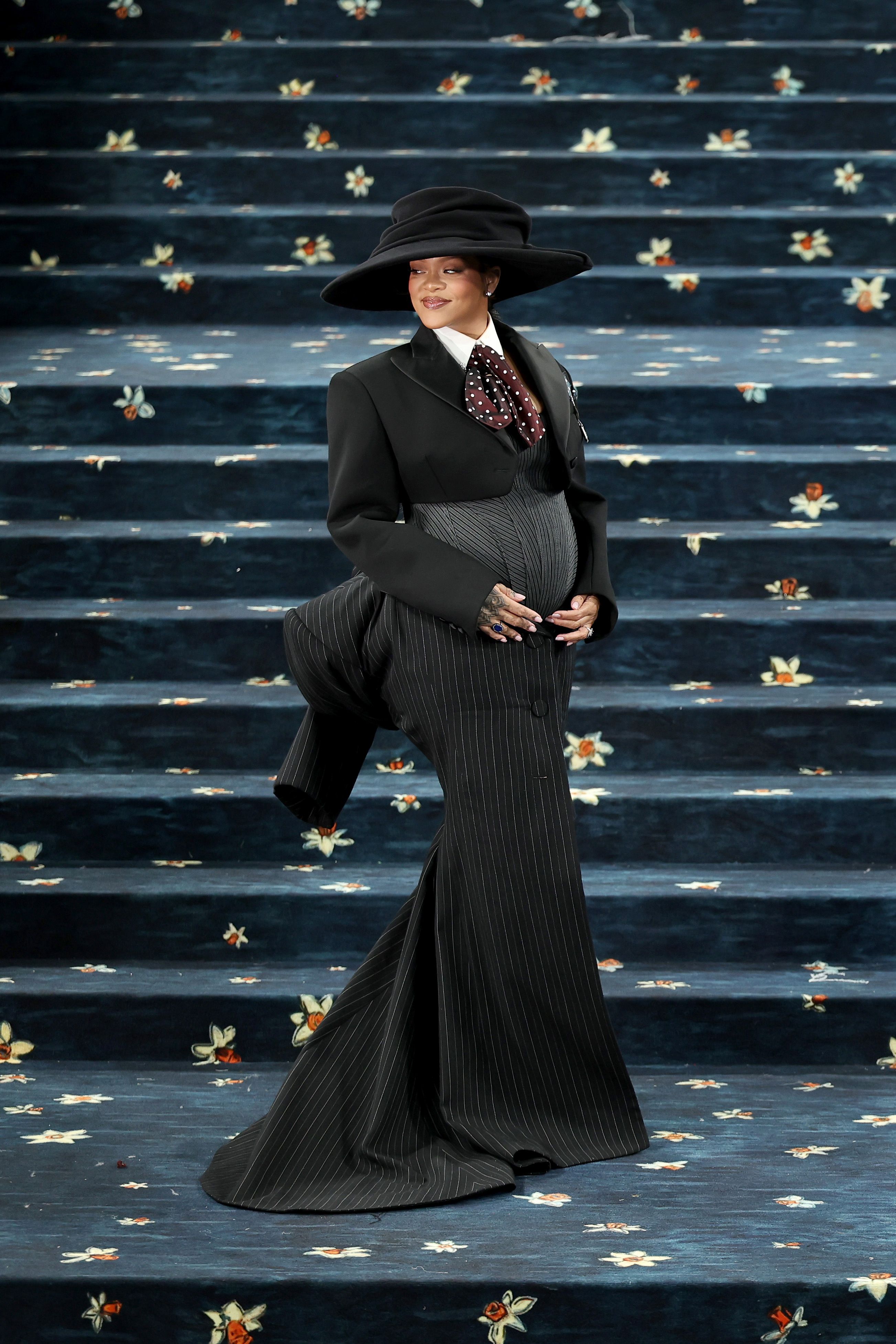 Rihanna showing off her baby bump in Marc Jacobs at the 2025 Met Gala