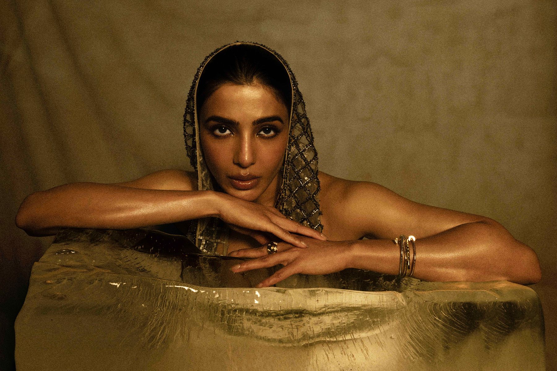 Samatha Ruth Prabhu resting on a block of ice wearing Bvlgari and Krésha Bajaj in the May 2026 cover story of The Nod