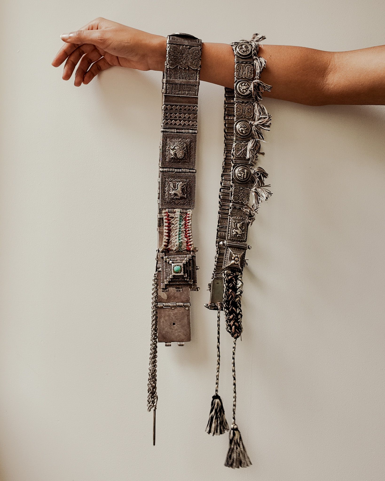 Two belts from Monica Shah’s collection of vintage silver belts