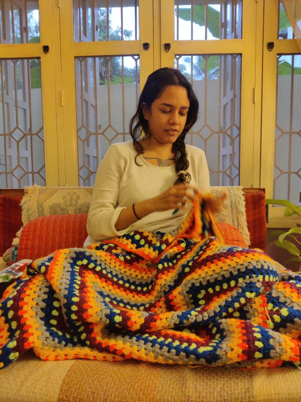 Pia Alizé Hazarika at work doing crochet